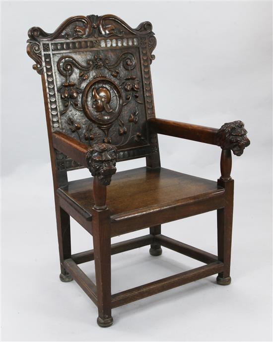 A 17th century style oak Wainscot chair, W.2ft 4in. H.3ft 8in.